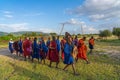 Group of Massai people participating a traditional dance with high jumps