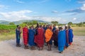 Group of massai warrior and masai woman participating a traditional dance