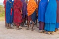 Group of massai warrior participating a traditional dance, view from the feet