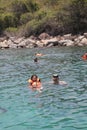 Nha Trang, Viet Nam - May 20,2018: People is swimming on the blue sea in a summer day