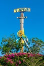 NHA TRANG, VIETNAM - APRIL 16, 2019: Attraction in the amusement park with pink flowers with the clear sky in background