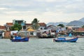 Nha Trang, Vietnam, January, 18, 2015. Boats near fishing village on the river Kai in Nha Trang in the evening