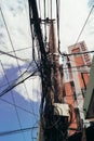 Nha Trang. Vietnam-2018. A large steel Eletric support with a large number of tangled wires and cables. A complete mess Royalty Free Stock Photo