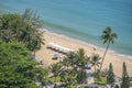 Aerial view of a sandy beach with sea water and coconut palm trees in the resort town of Nha Trang Vietnam Royalty Free Stock Photo