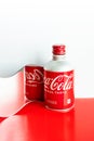 Nha Trang, Vietnam - march 2023. Coca Cola aluminium bottle. Creative red white still life of soda pop bottle