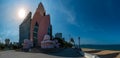 Nha Trang, Vietnam. May 17, 2019: Tower Incense Tram Huong a city icon with Nha Trang`s beach and modern downtown skyline