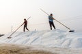 Workers shape a salt pile at the Hon Khoi salt fields in Nha Trang, Vietnam