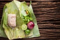 Nham sour pork in banana leaves thai food Royalty Free Stock Photo