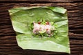 Nham sour pork in banana leaves thai food Royalty Free Stock Photo