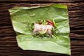 Nham sour pork in banana leaves thai food Royalty Free Stock Photo