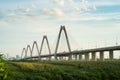 Nhat Tan bridge viewing from wild land on Red River riverbed Royalty Free Stock Photo