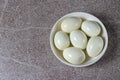 Boiled peeled eggs without shell on a plate. Ingredients for cooking.