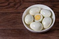 Boiled peeled eggs without shell on a plate. Ingredients for cooking.