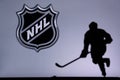 NHL Hockey Concept photo. silhouette of profesiional NHL hockey player Royalty Free Stock Photo
