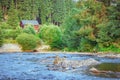 House by the mountain river