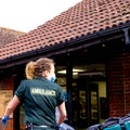 NHS Ambulance Paramedic In Uniform On An Emergency Call