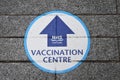 NHS Scotland Vaccination Centre sign on pavement