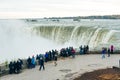 NIAGARA FALLS - CANADA, december 2019 Horseshoe Falls from the Canadian side of Niagara Falls with tourists Royalty Free Stock Photo