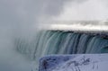 Niagara Falls cascading in winter season Royalty Free Stock Photo