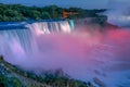 Niagara Falls at dusk during light show - US Side Royalty Free Stock Photo