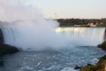 The Niagara Falls at night was illuminated by the lights.