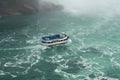 NIAGARA FALLS, ONTARIO, CANADA - MAY 21st 2018: The Maid of the Mist cruise ferry transports tourists through the mist Royalty Free Stock Photo