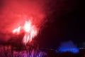 NIAGARA FALLS, ONTARIO, CANADA - MAY 20th 2018: Niagara Falls lit at night by colorful lights with fireworks Royalty Free Stock Photo