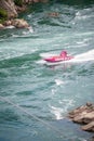 Niagara Falls, Ontario Canada - September 17, 2018 : A `Whirlpool Jet Boat Tours` boat racing down the Niagara River Royalty Free Stock Photo