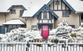 NIAGARA ON THE LAKE,CANADA - DECEMBER 2, 2019: Beautiful house covered snow located in the Queen Street, Niagara on the Lake, Royalty Free Stock Photo