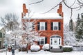 NIAGARA ON THE LAKE,CANADA - DECEMBER 2, 2019: Beautiful house covered snow located in the Queen Street, Niagara on the Lake, Royalty Free Stock Photo