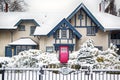 NIAGARA ON THE LAKE,CANADA - DECEMBER 2, 2019: Beautiful house covered snow located in the Queen Street, Niagara on the Lake. Royalty Free Stock Photo