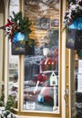 NIAGARA ON THE LAKE,CANADA - DECEMBER 2, 2019: Fashion store showcase with Christmas decoration located in the Queen Street. Royalty Free Stock Photo