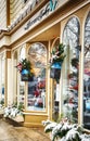 NIAGARA ON THE LAKE,CANADA - DECEMBER 2, 2019: Fashion store showcase with Christmas decoration located in the Queen Street. Royalty Free Stock Photo