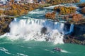 Niagara River American Falls in autumn foliage season. Niagara City Cruise Boat Tour. Niagara Falls City Royalty Free Stock Photo