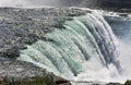 The Niagara River crashing over the famous Niagara Falls Royalty Free Stock Photo