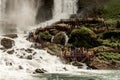 Niagra Falls Canada 06.09.2017 view of the American part of Horseshoe Falls with visitors walking wooden trails Royalty Free Stock Photo