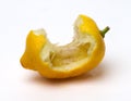 Nibbled lemon on white Royalty Free Stock Photo