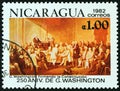 NICARAGUA - CIRCA 1982: A stamp printed in Nicaragua shows Washington signing the Constitution, circa 1982.