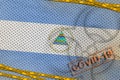Nicaragua flag and Covid-19 biohazard symbol with quarantine orange tape and stamp. Coronavirus or 2019-nCov virus concept