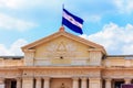 Nicaragua flag on the national Palace. Nicaragua flag on the sky background.