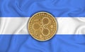 Nicaragua flag, ripple gold coin on flag background. The concept of blockchain, bitcoin, currency decentralization in the country