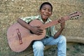 Nicaraguan Boy playing on his guitar, Nicaragua Royalty Free Stock Photo