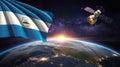 Nicaraguan flag and satellite orbiting earth at sunrise Royalty Free Stock Photo