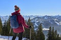 Active senior woman snowshoeing in in the Allgau alps above Immenstadt