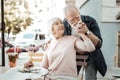 Nice aged man kissing his wifes hand