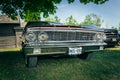 nice amazing front view of classic vintage retro car standing in park Royalty Free Stock Photo