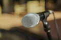 Nice amazing view of microphone detailed head against blurred outdoor background