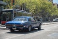 classic car, Mercury Cougar XR7 in blue color on the streets of the European city