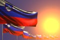Nice many Slovenia flags placed diagonal on sunset with place for text - any celebration flag 3d illustration