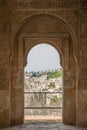 Nice arch door in ancient Arabian palace Alhambra. Granada, Spain Royalty Free Stock Photo